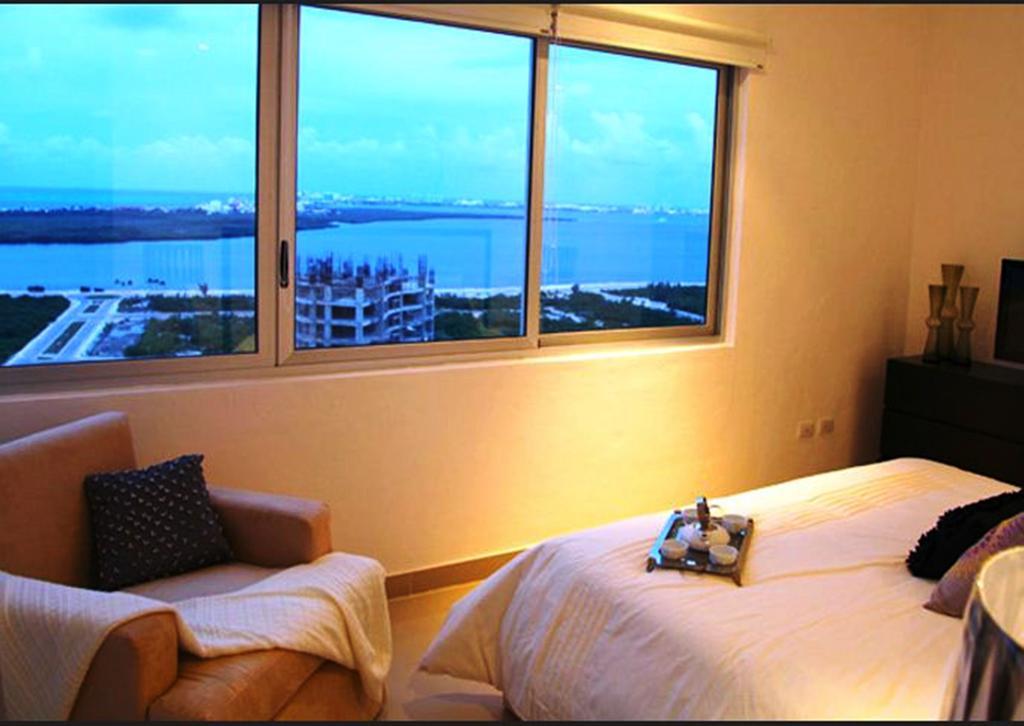 Suites Malecon Канкун Номер фото